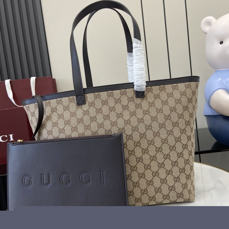 G*u*i shopping bags